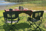 Alu-Cab Alu-Table set up with two Front Runner Folding Chairs, with a lake in the background