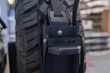 Alu-Cab Can Crusher mounted to the spare wheel of an off-road vehicle. Camp 4x4