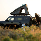 Alu-Cab LT50 lightweight rooftop tent on a off-road vehicle with a Front Runner roof rack  in a natural setting. Camp4x4. camp 4x4, overlanding, camping gear
