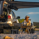 Alu-Cab Shadow Awning and Gen3.R rooftop tent in use with picnic and beach scene. Camp4x4. camp 4x4, overlanding, camping. Double Cab. Single Cab. Extra Cab